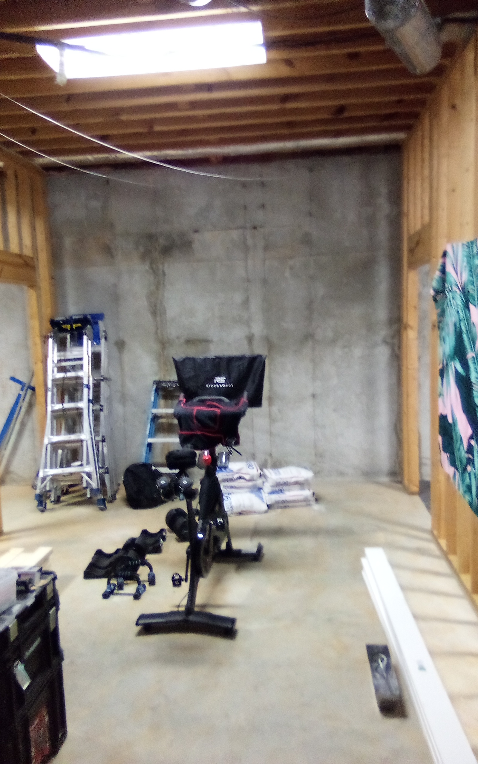 Before Remodel: An Empty Basement Awaits Its Transformation into a Dream Home Gym